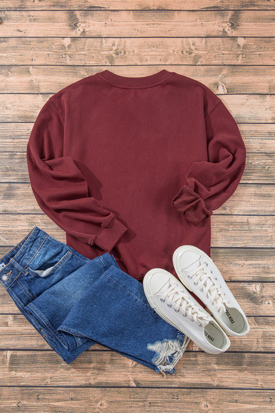 Solid burgundy sweatshirt with dropped shoulders and round neck