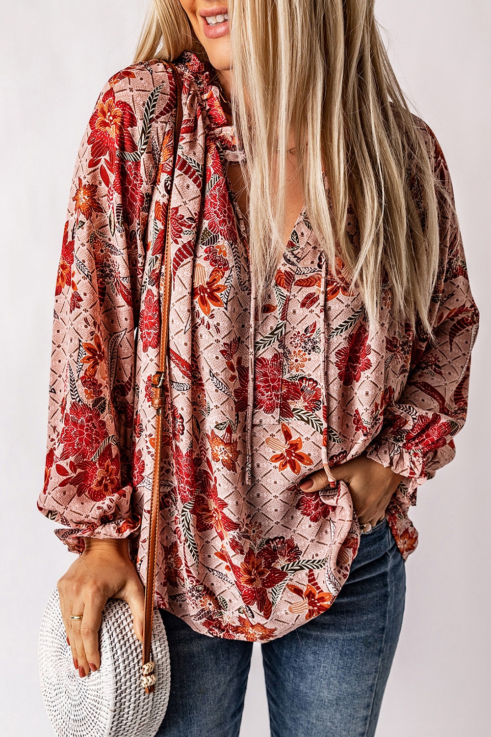 Blouse imprimée rose fendue à col en V