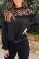 Long sleeve and ruffled blouse in black leopard mesh