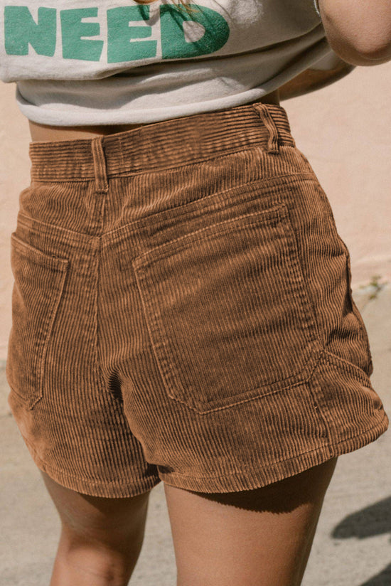 Vintage brown corduroy shorts with elastic waist and back pockets