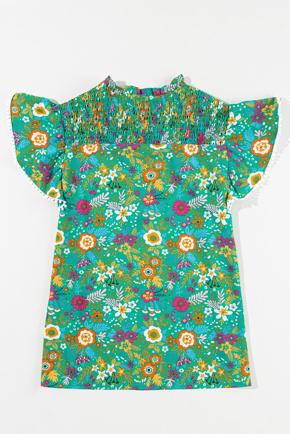 Blouse florale tropicale à manches flottantes et bordure en dentelle verte