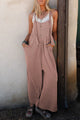 Ample overalls with adjustable straps and cord, wide leg