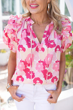 Pink flower high with split neck and puffy sleeves with ruffles