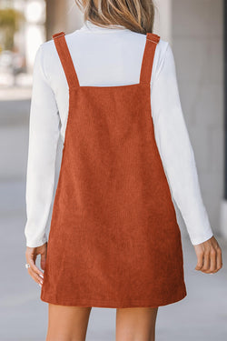 Sleeveless velvet overall dress with pockets before cinnamon units