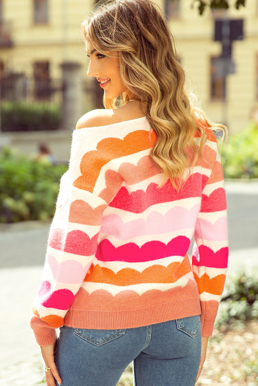 Pink red striped sweater with balloon sleeves and dropped shoulders