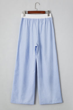 Pantalones de cintura elástica alta con rayas azules *