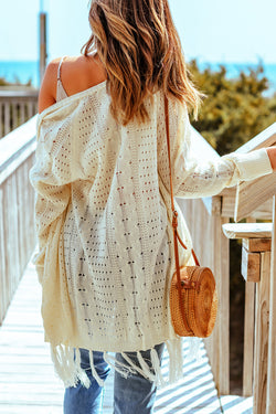 Beige openwork cable knit cardigan with tassels