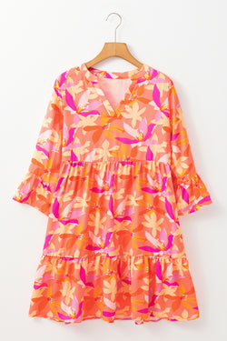 Orange dress with abstract print and ruffled sleeves, V-neck