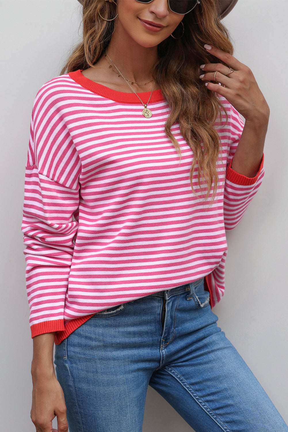 Pink drop shoulder sweater with contrasting edge stripes