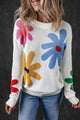 Colored white round -neck sweater with large flowers pattern