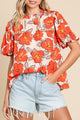 Blusa de manga suelta naranja y cuello volador y patrón floral