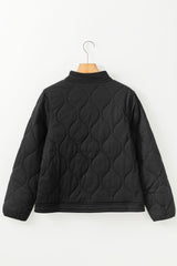 Veste matelassée noire à boutons-pression de couleur unie