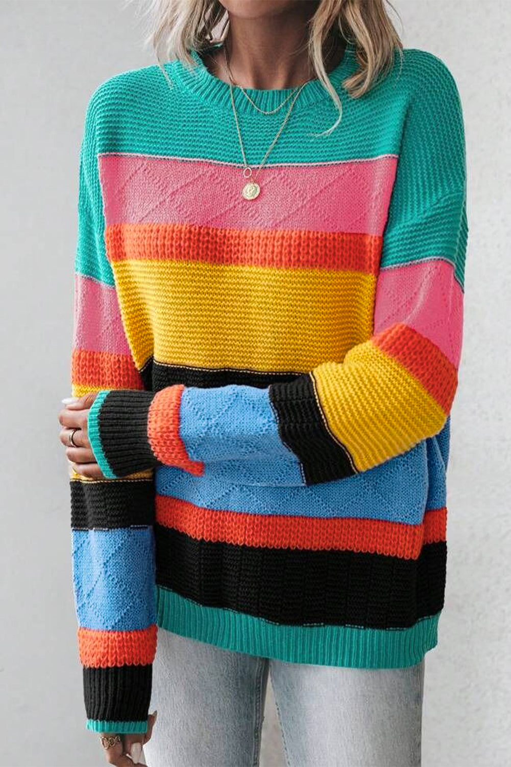 Yellow sweater with drooping shoulders and mixed textures color block