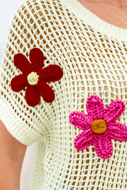 Suéter blanco con flores de crochet de trabajo abierto*