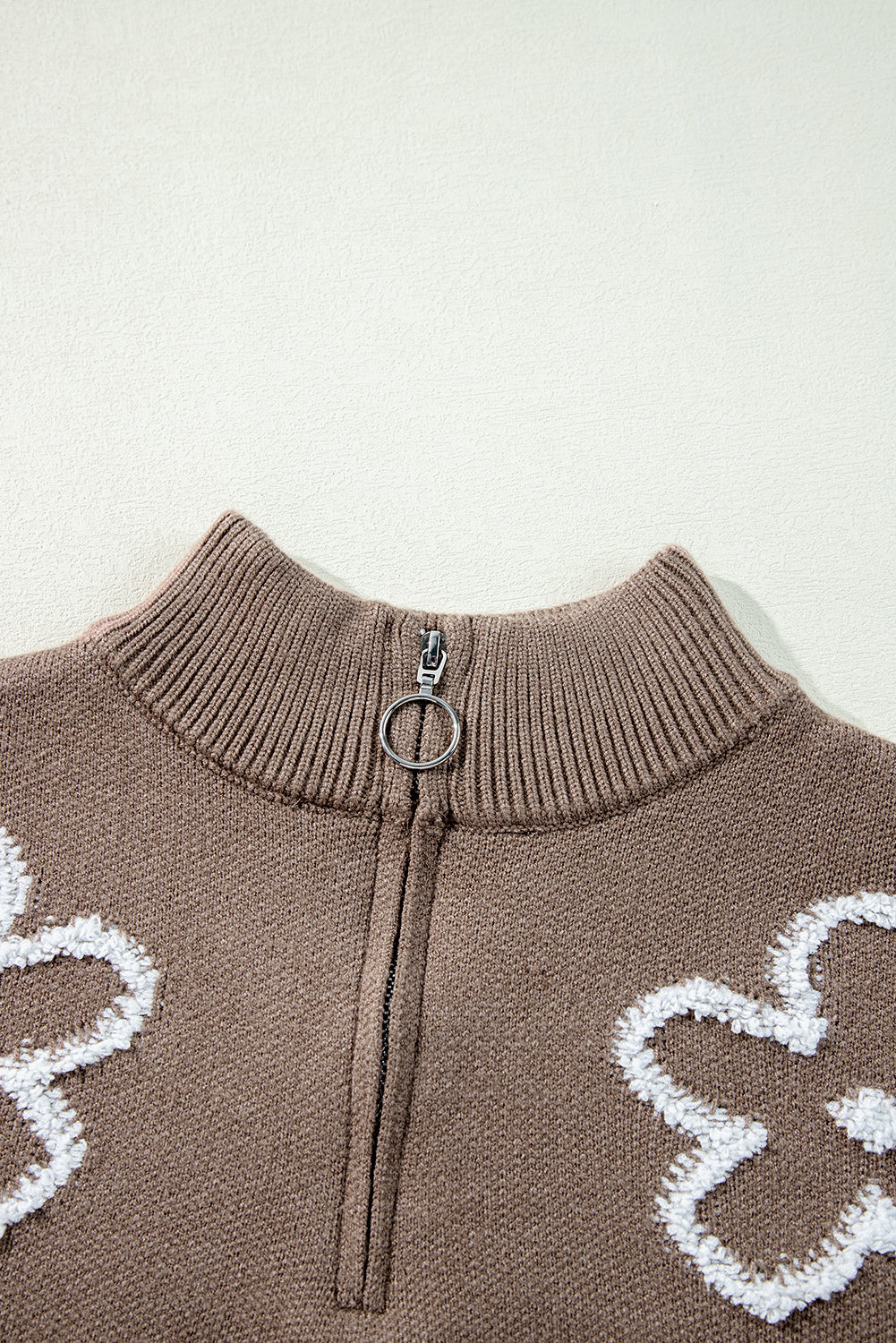 Half-zip mock neck sweater with contrasting parchment flowers