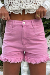 Mid-rise pink denim shorts with frayed edges