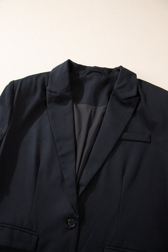 Black buttoned blazer with flap pocket and lapels