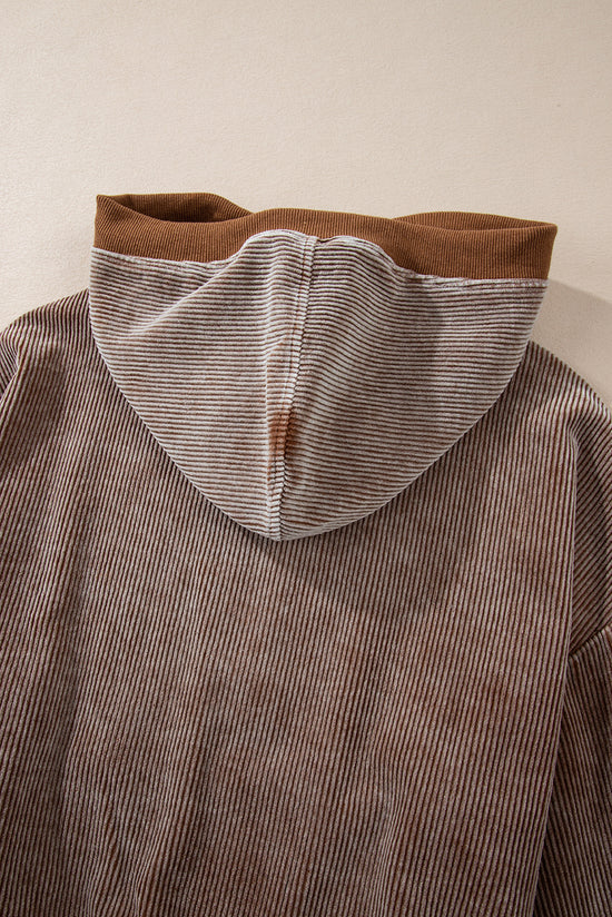 Brown corduroy hoodie with half zip and kangaroo pocket with drawstring