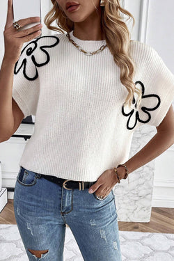 Haut pull brodé de fleurs blanches