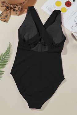 Black monokini with a deep -turned V -neck collar Gathered dar