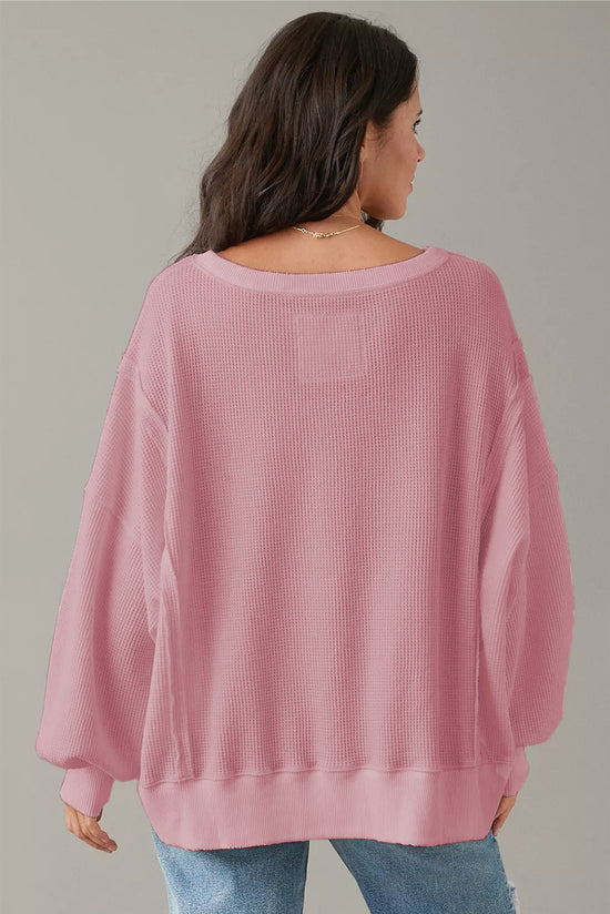 Haut oversize fendu à manches évêque en tricot gaufré rose