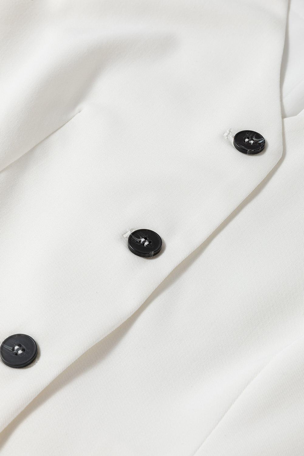 White costume vest with united buttoned V -neck colored
