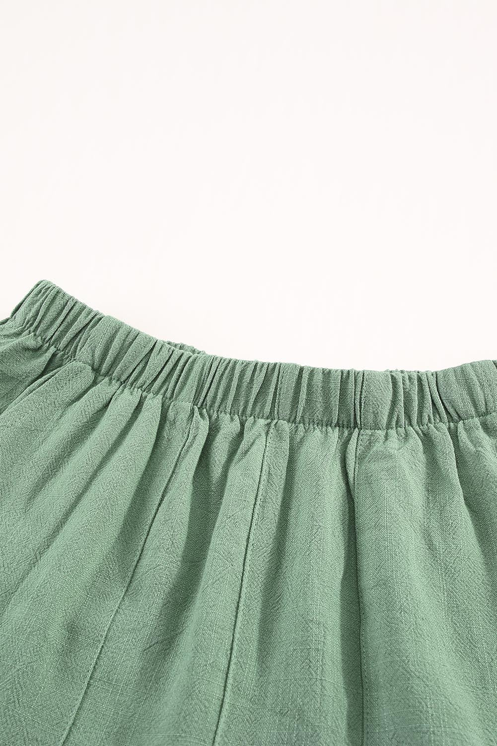 Green high waisted ruffled pocket shorts