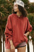 Ample hooded sweatshirt with tightening cord and drooping shoulder pockets Red Clay