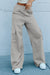 Large and multi-pocket drive pants with high light gray high-gray lace-up lace-ups