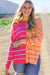 Loose fit knitted sweater with multi-colored stripes