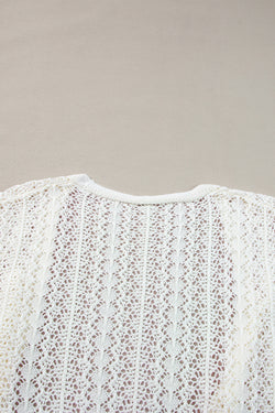 Cardigan blanc élégant en tricot ajouré *