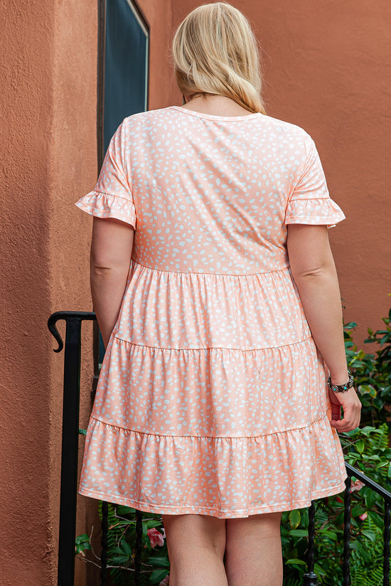 Large pink dress with ruffles and cheetah prints on several levels