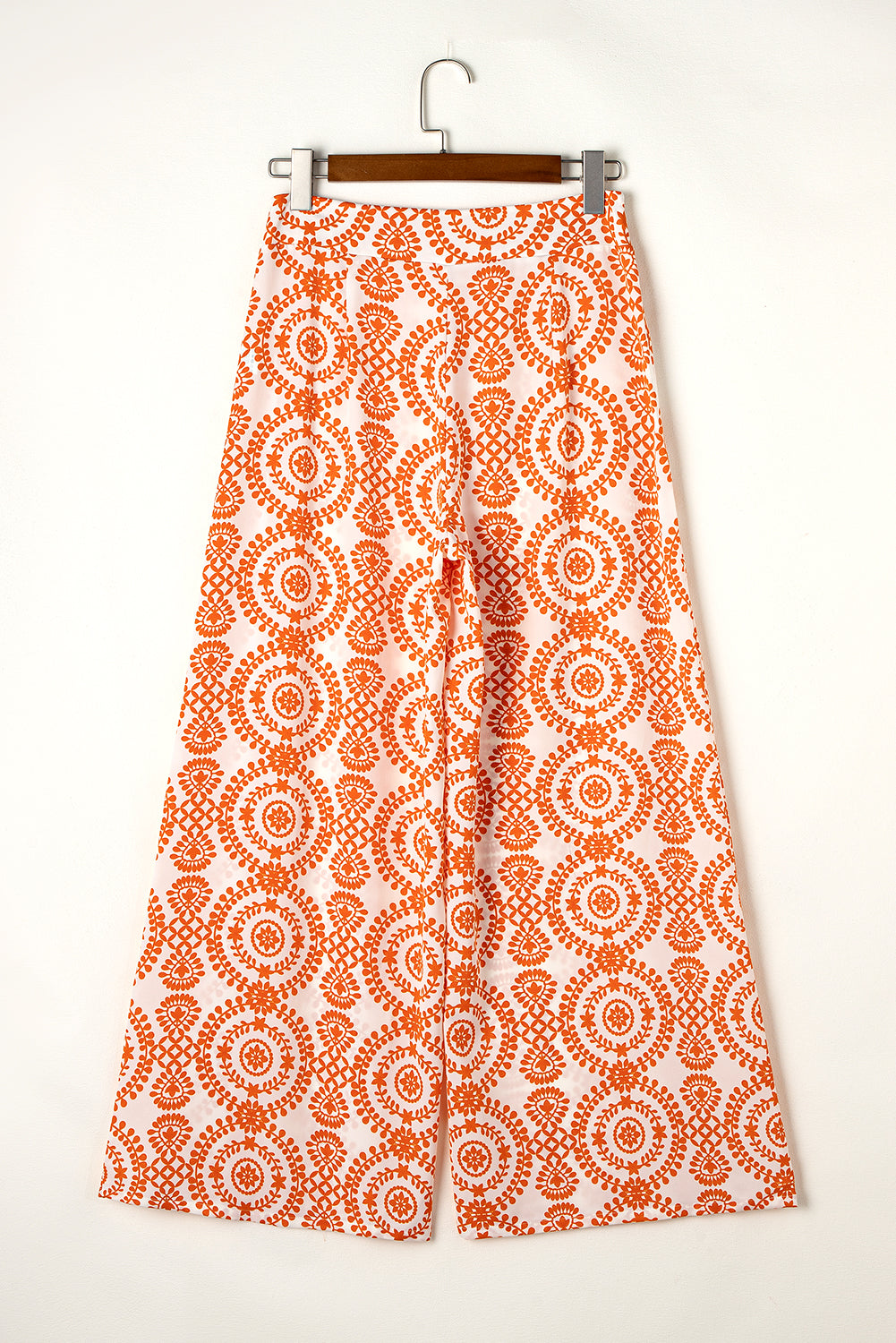 Pantalon large orange à imprimé floral style bohème rétro