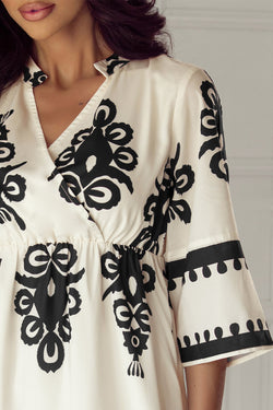 Beige loose midi dress with western geometric print and 3/4 sleeves