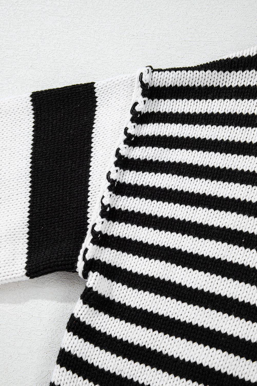 Black and white striped bishop sleeve drop shoulder knit sweater