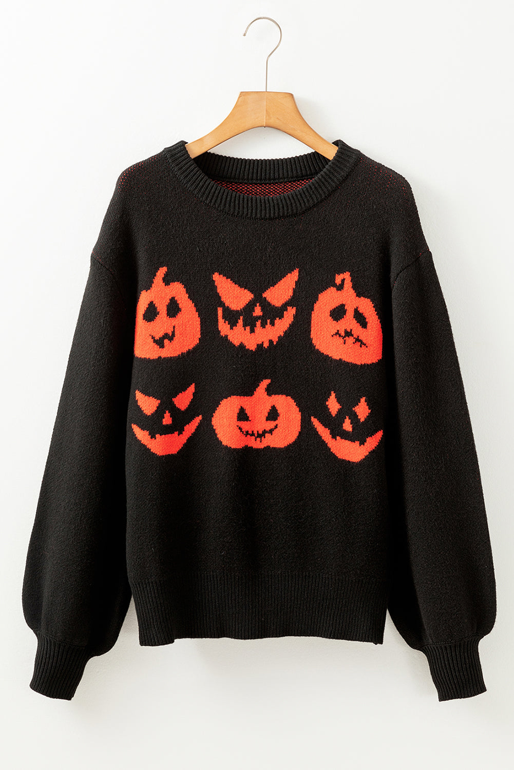 Black shoulder sweater and Halloween pumpkin face pattern