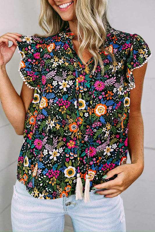 Blusa floral tropical de manga de aleteo de borde negro