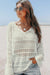 White V -neck sweater and openwork hook