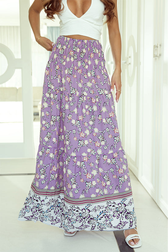 Long -sized long -waisted skirt with purple floral print