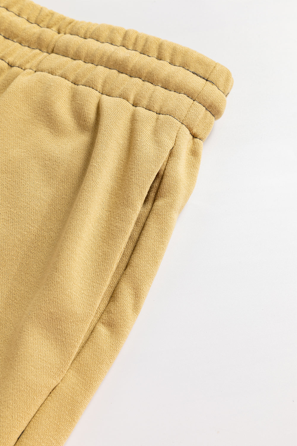 Beige high waisted drawstring fitted band pants