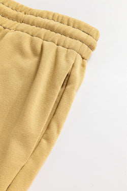 Pantalones de cintura alta con tira ajustada con cordón de apriete beige