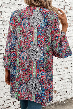 Red open front kimono with paisley print