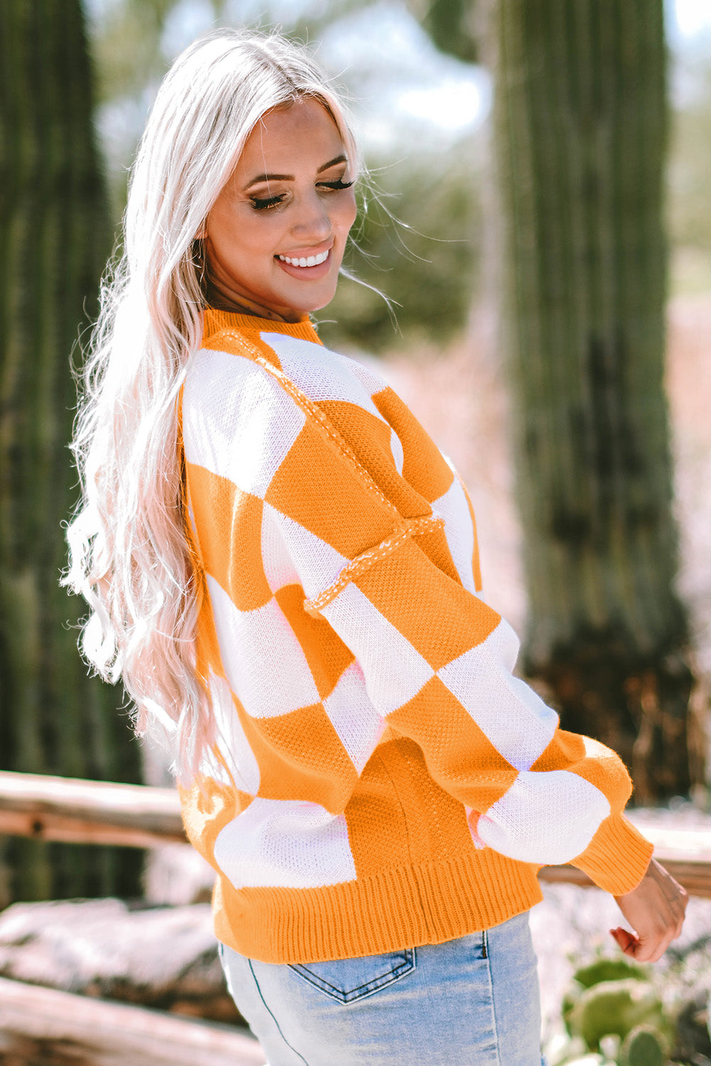 Pull orange à manches évêque à carreaux