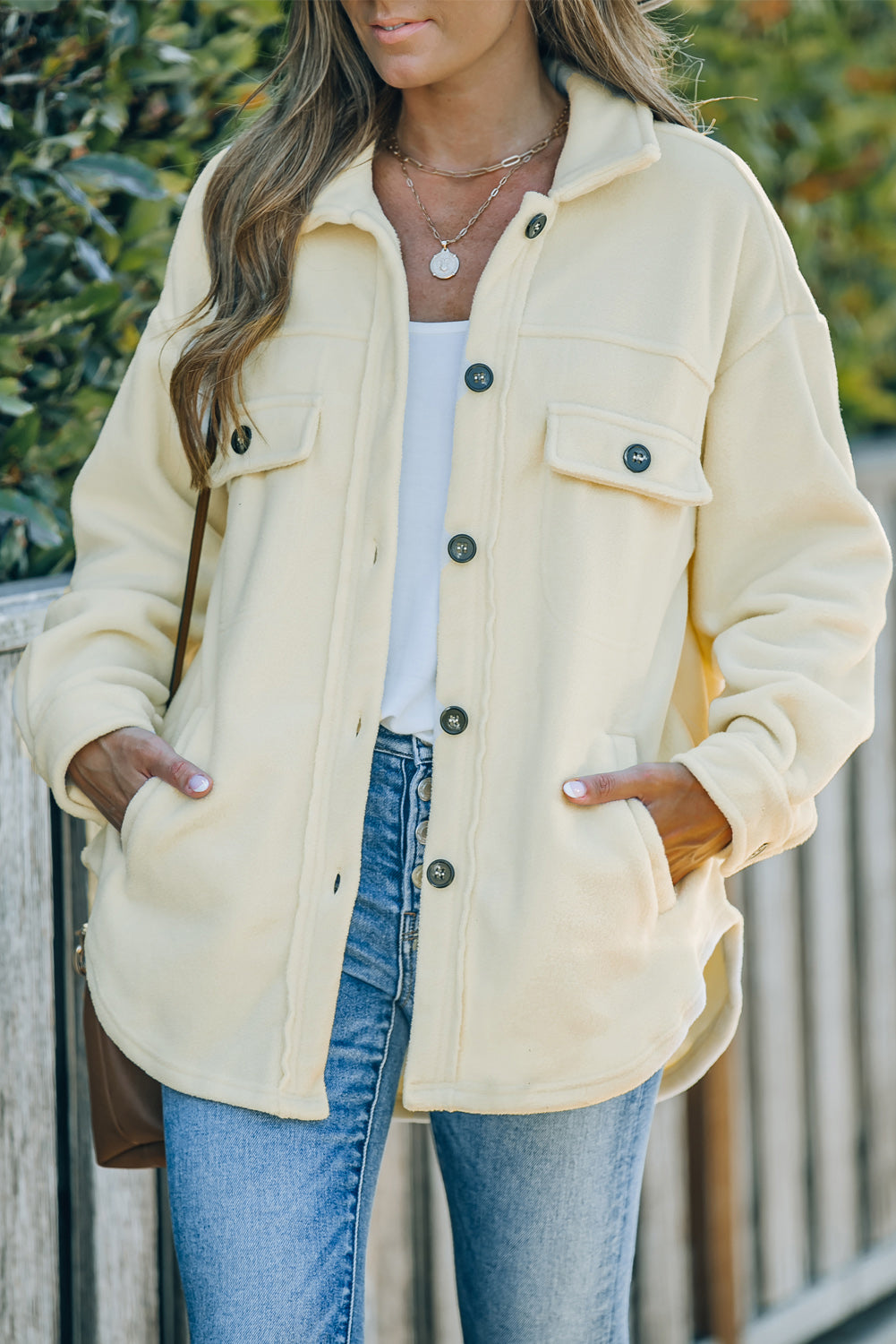 Beige button-down shirt jacket with turn-down collar