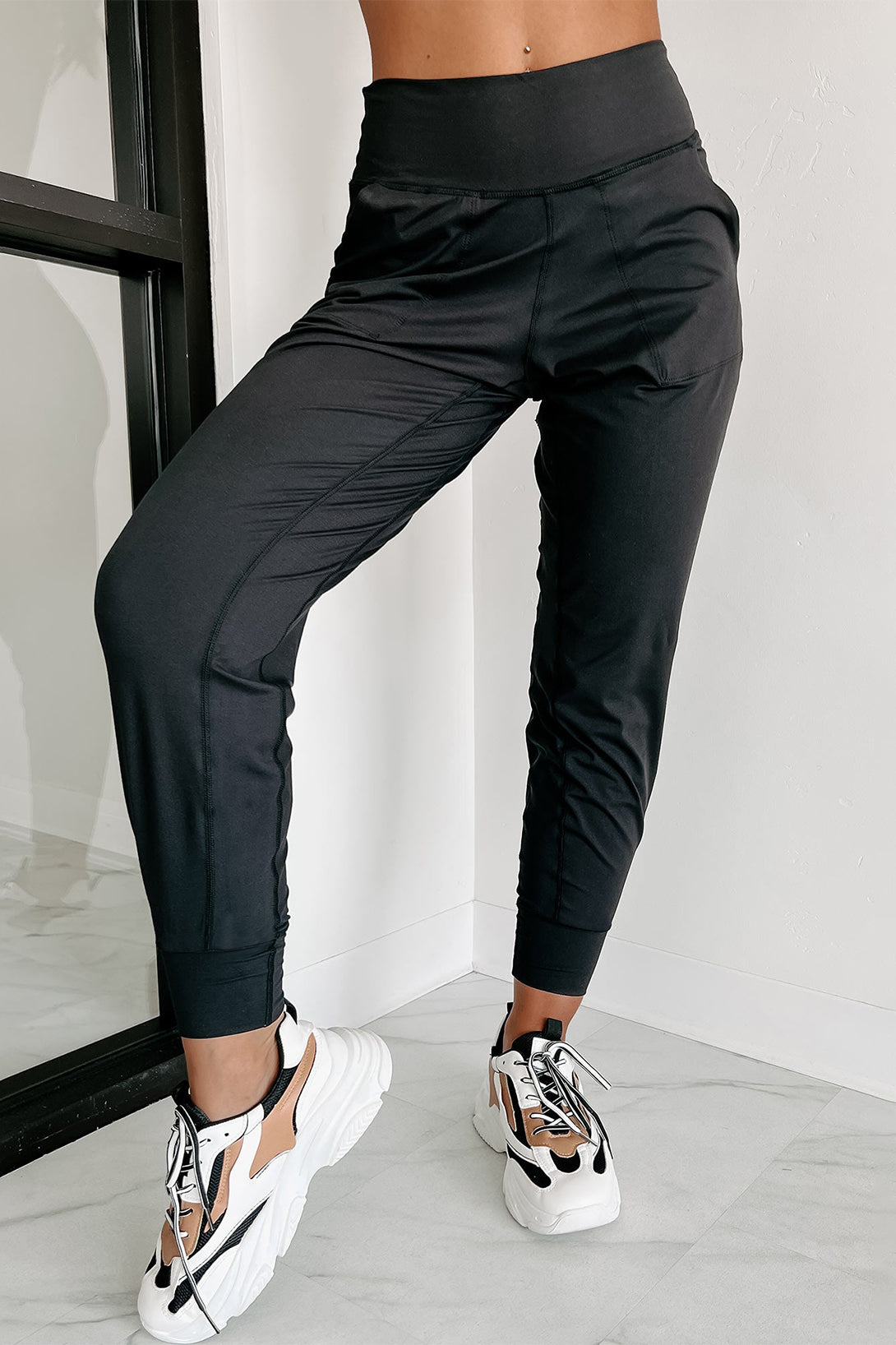 Pantalon de jogging taille haute noir avec poches et coutures apparentes