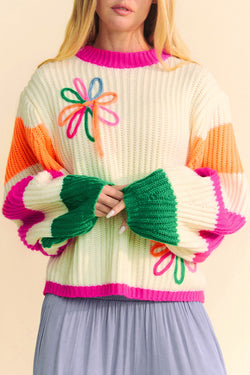 Ample twisted knit sweater with floral print color block beige