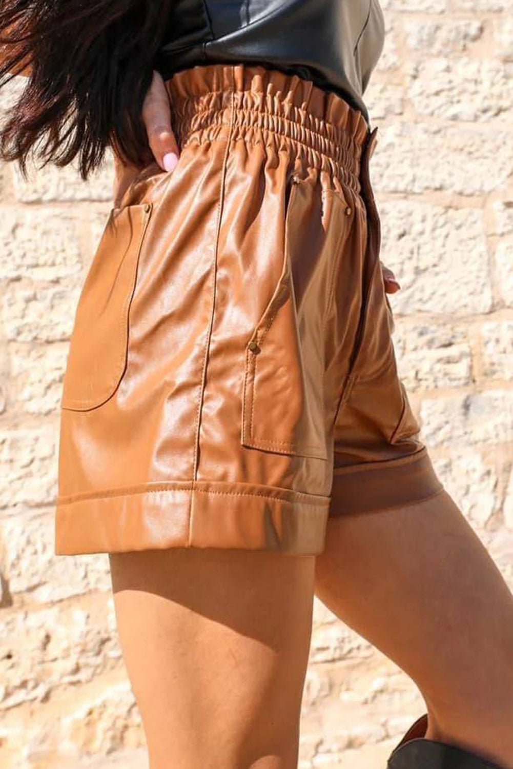 Brown faux leather high waisted shorts with patch pockets