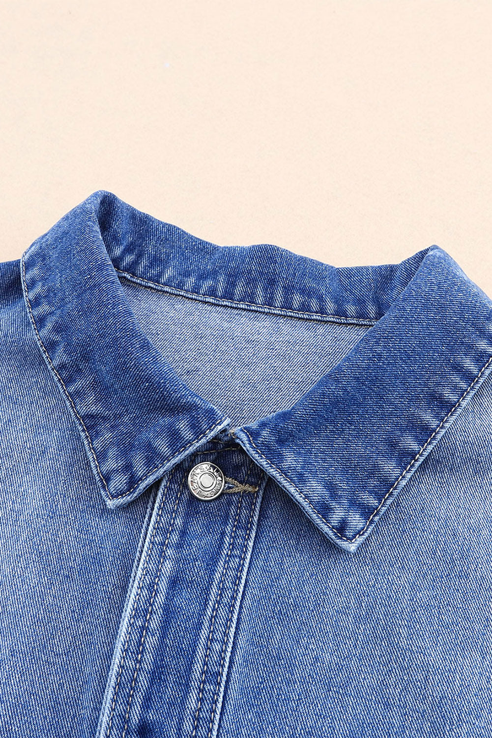 Veste en jean ample bleue avec poches poitrine et épaules tombantes