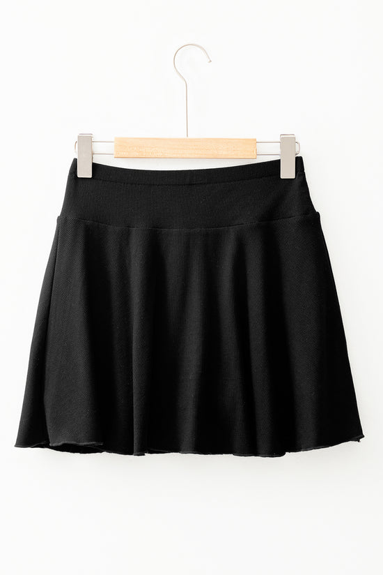 Jupe-short trapèze noire taille haute drapée *