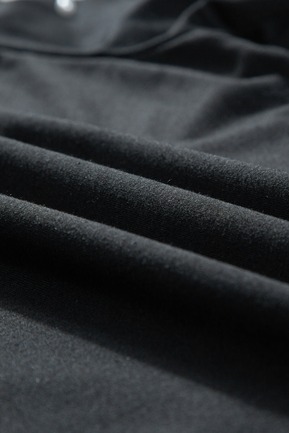 Black top with mid-long puffing sleeves with pearls and rhinestones